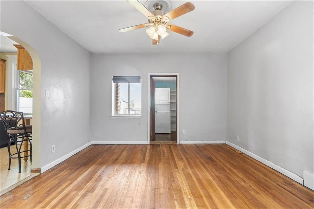 1622 Methyl Street Pittsburgh, PA 15216 - Photo 10 of 45 a view of a room with wooden floor and a ceiling fan