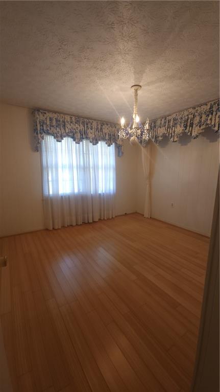 4 Glen View Drive Northeast Rome, GA 30165 - Photo 13 of 18 an empty room with wooden floor and windows