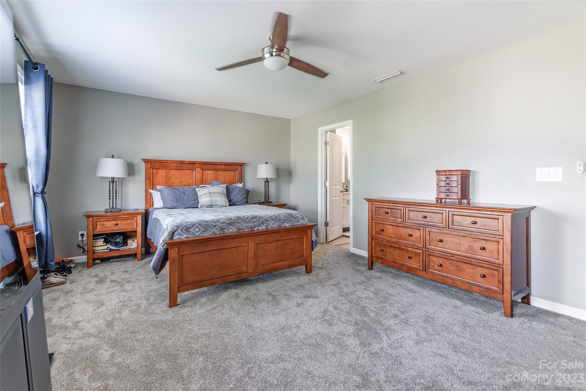 2210 Durand Road Fort Mill, SC 29715 - Photo 12 of 27 a bed room with a bed and a chair