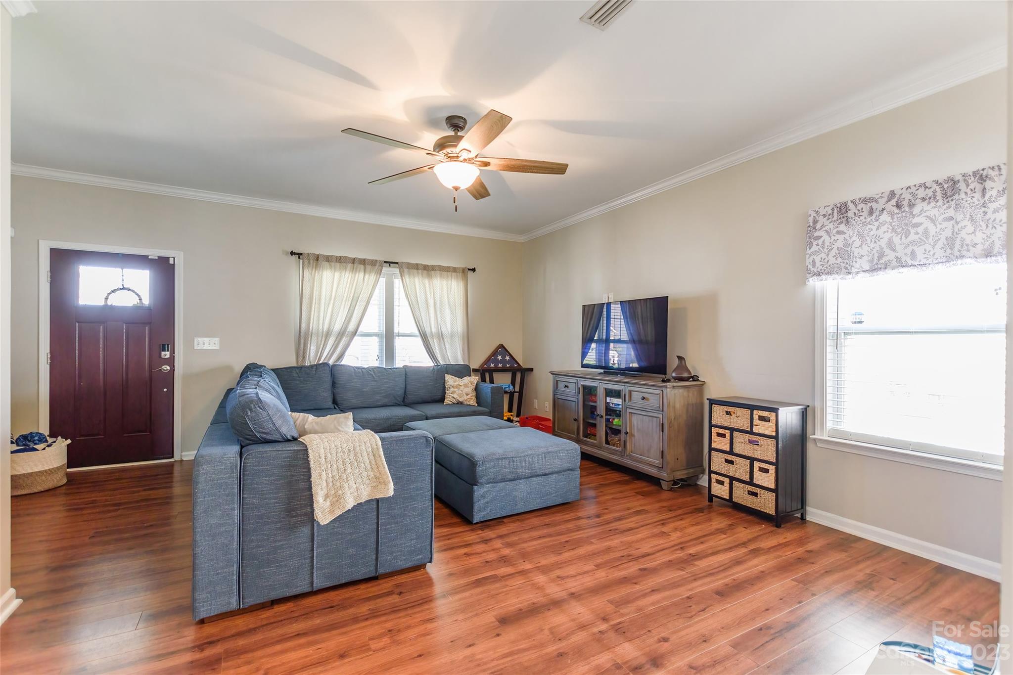 2210 Durand Road Fort Mill, SC 29715 - Photo 3 of 27 a living room with furniture and a flat screen tv