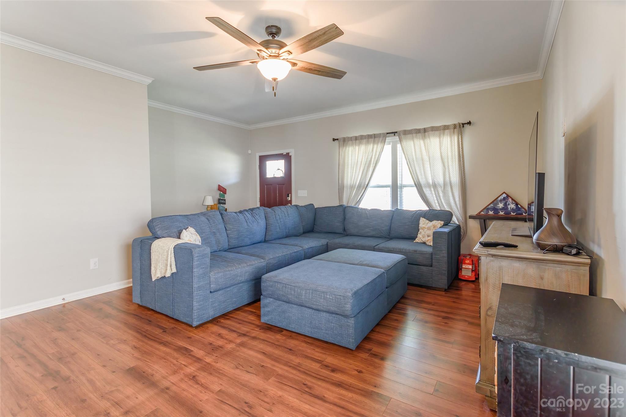 2210 Durand Road Fort Mill, SC 29715 - Photo 4 of 27 a living room with furniture and a flat screen tv