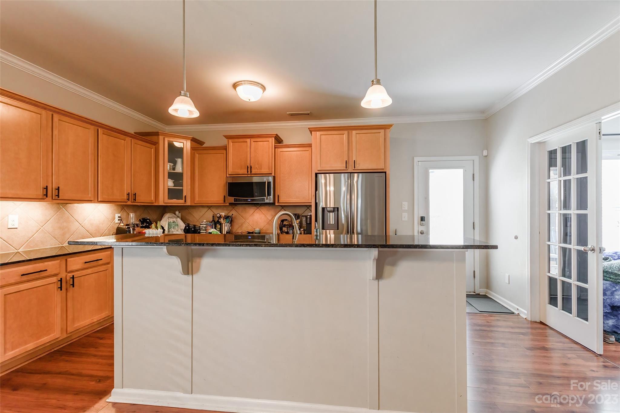 2210 Durand Road Fort Mill, SC 29715 - Photo 7 of 27 a kitchen with stainless steel appliances granite countertop a sink a stove and cabinets