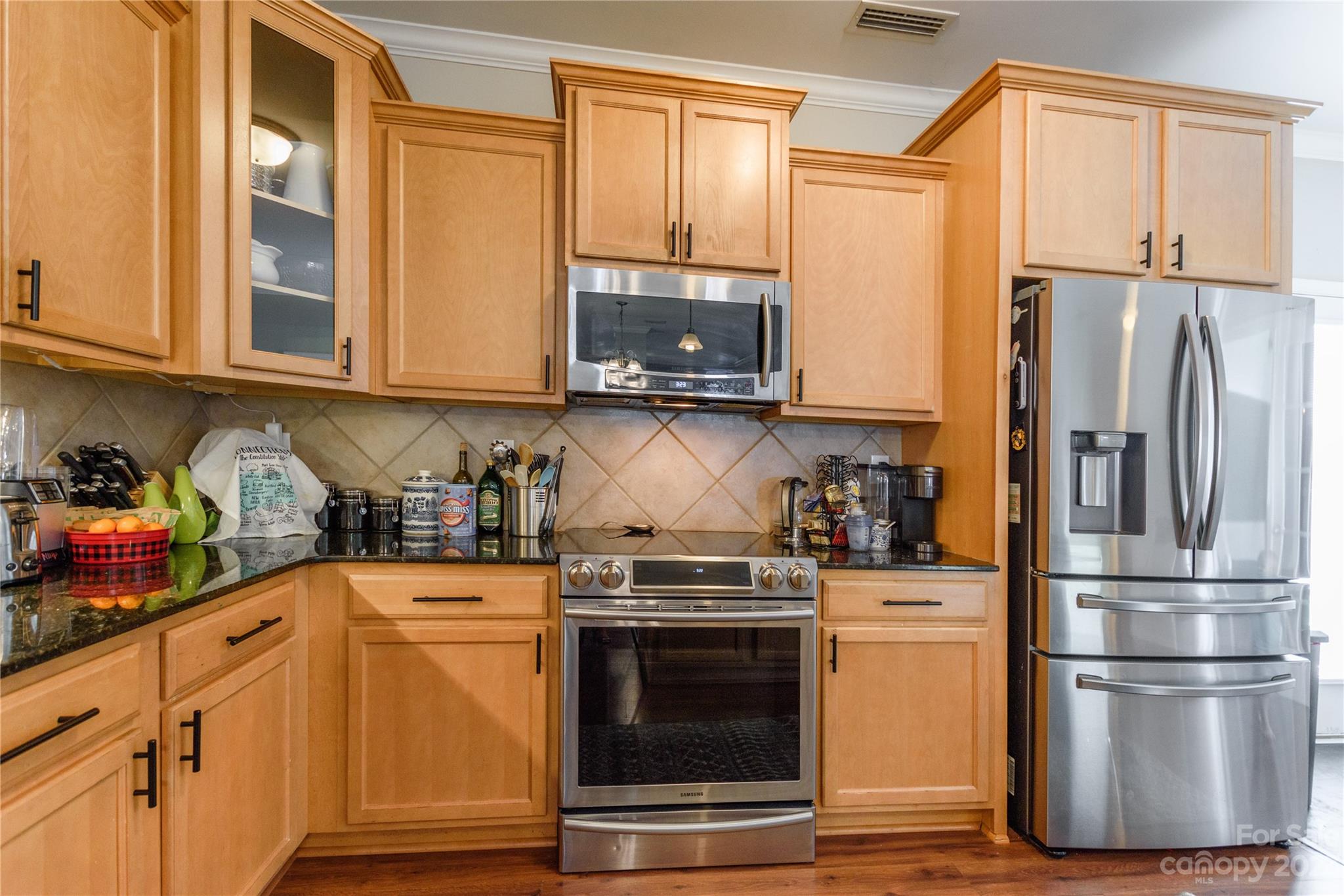 2210 Durand Road Fort Mill, SC 29715 - Photo 9 of 27 a kitchen with stainless steel appliances granite countertop a refrigerator stove and sink