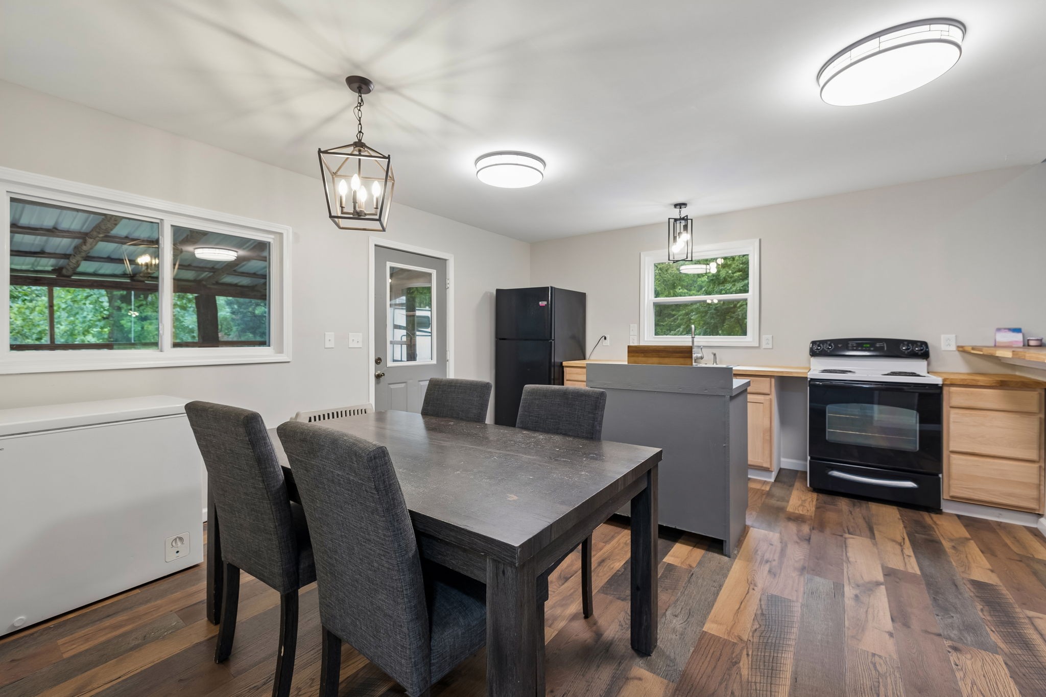 121 Hannah Road Summertown, TN 38483 - Photo 21 of 52 a view of a dining room with furniture window and wooden floor