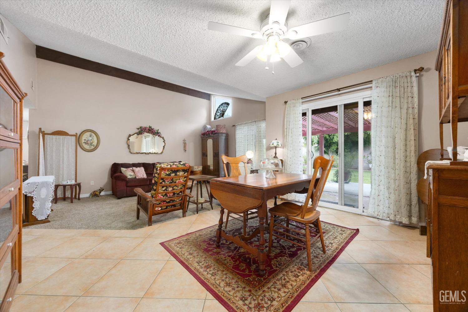 Undisclosed Address Bakersfield, CA 93309 - Photo 11 of 43 a view of a dining room with furniture