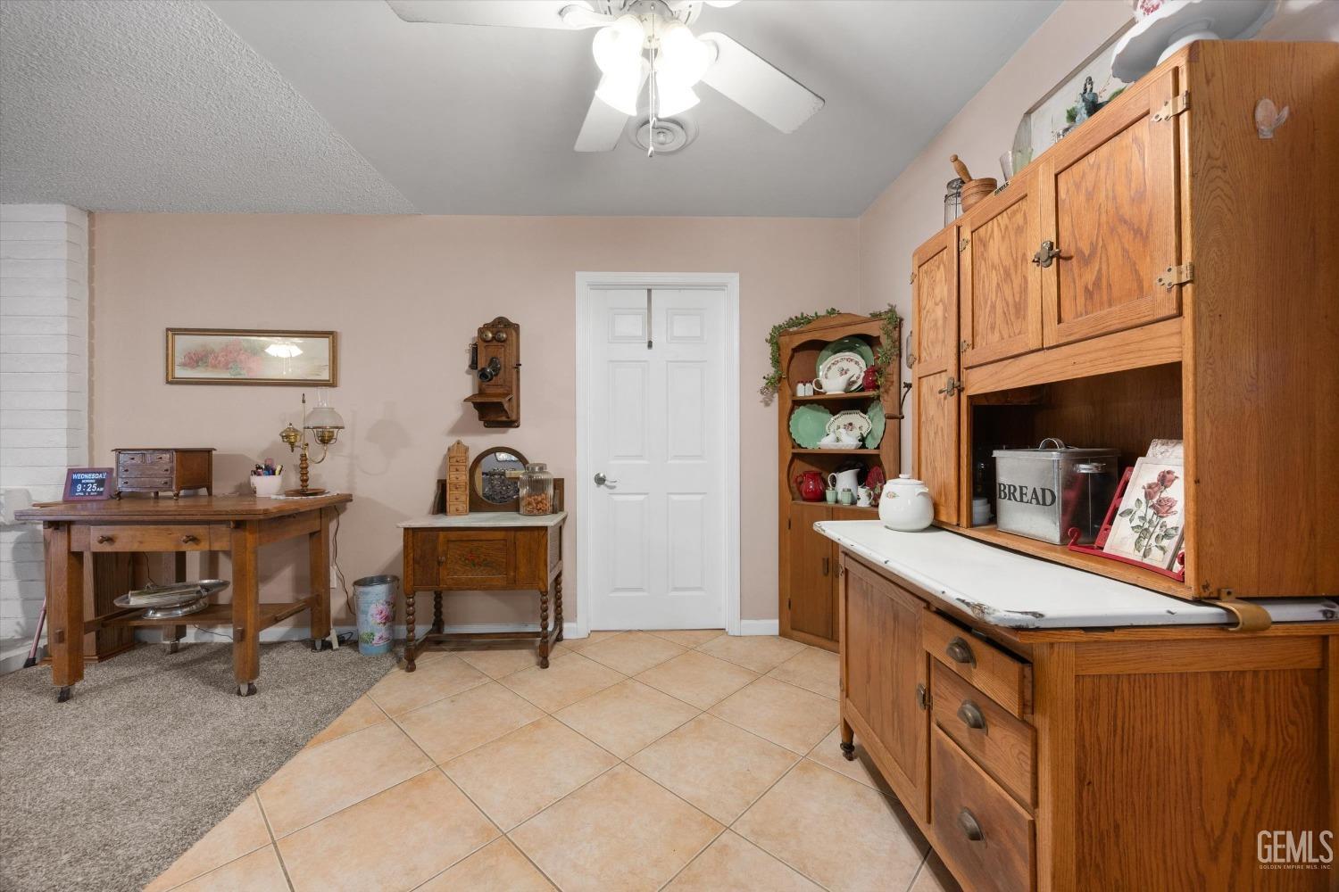 Undisclosed Address Bakersfield, CA 93309 - Photo 16 of 43 a bedroom with furniture and a window