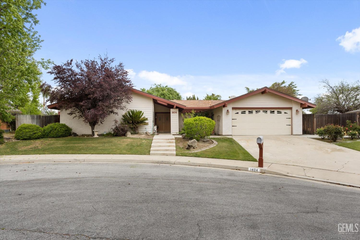 Undisclosed Address Bakersfield, CA 93309 - Photo 3 of 43 a view of sign board with flower around