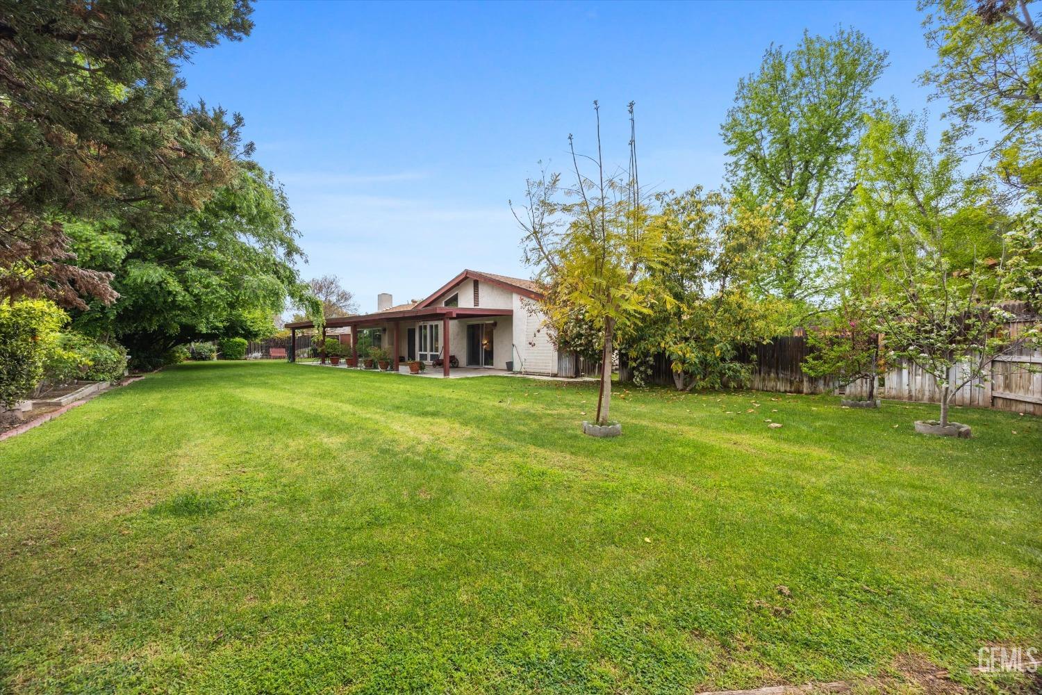 Undisclosed Address Bakersfield, CA 93309 - Photo 42 of 43 a view of a house with a big yard
