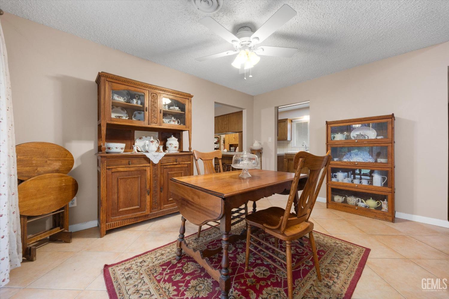 Undisclosed Address Bakersfield, CA 93309 - Photo 10 of 43 a view of a dining room with furniture