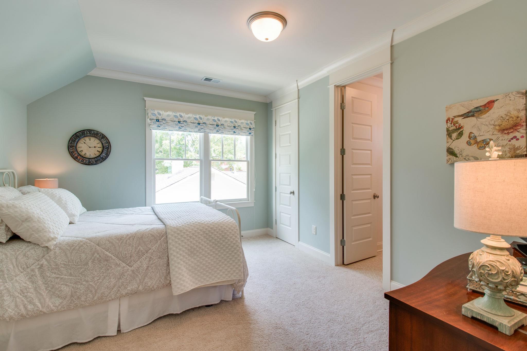 206 Franklin Road Franklin, TN 37064 - Photo 24 of 30 a bedroom with a bed and a window