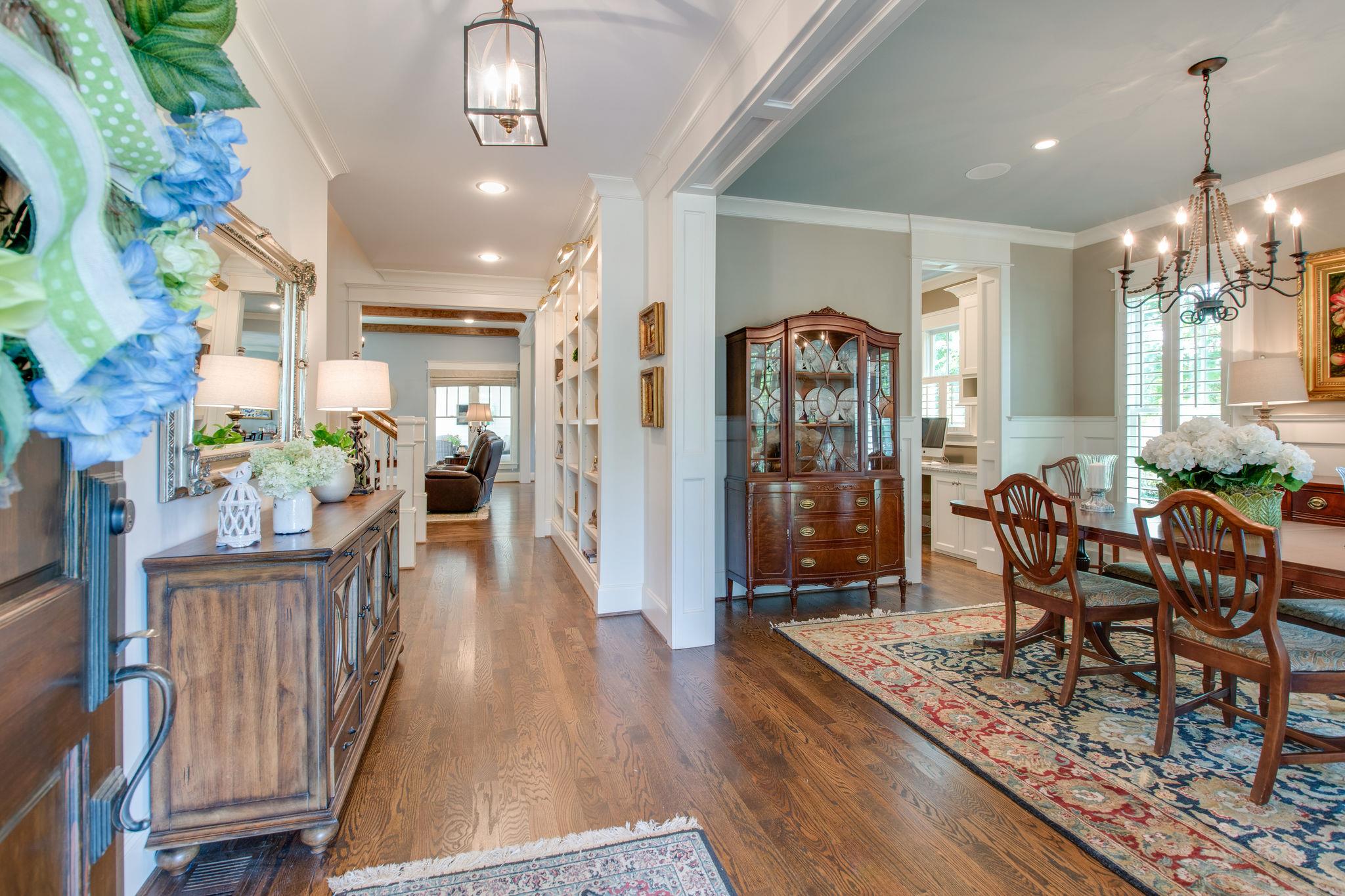 206 Franklin Road Franklin, TN 37064 - Photo 4 of 30 a view of a dining room with furniture window and wooden floor
