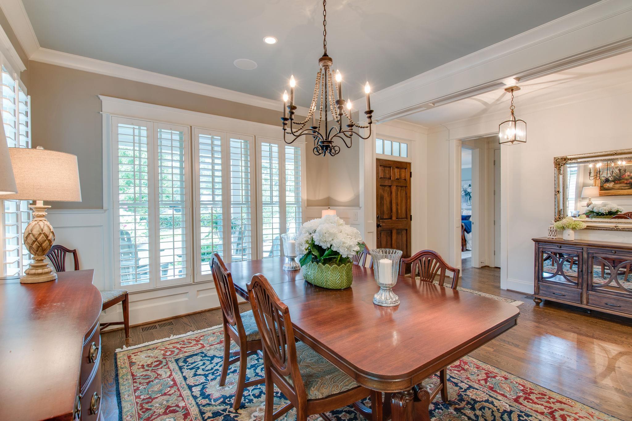 206 Franklin Road Franklin, TN 37064 - Photo 6 of 30 a view of a dining room with furniture window and wooden floor