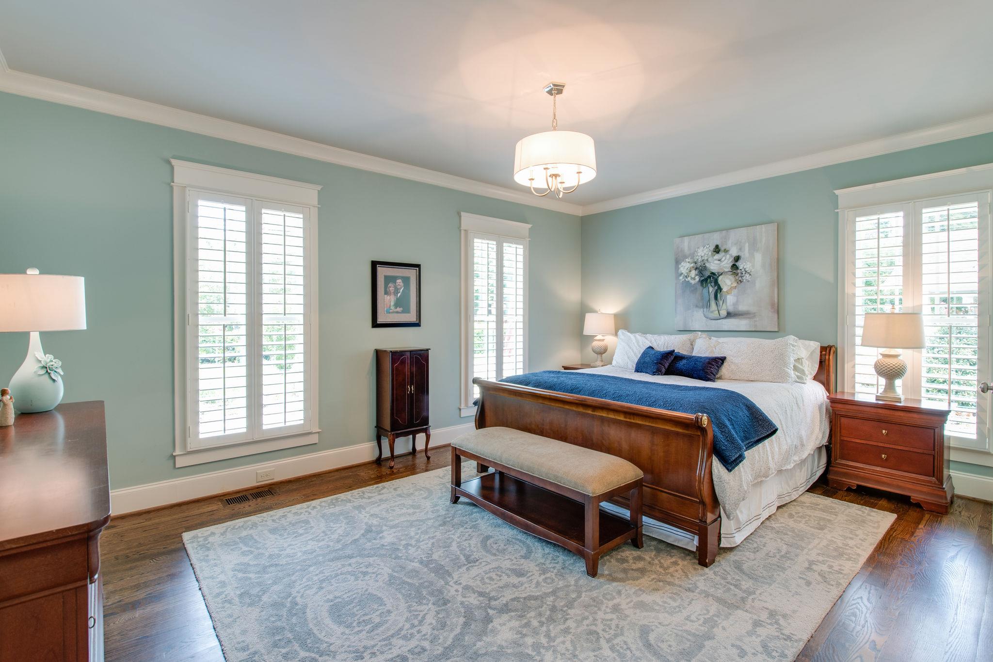 206 Franklin Road Franklin, TN 37064 - Photo 7 of 30 a spacious bedroom with a bed and a window
