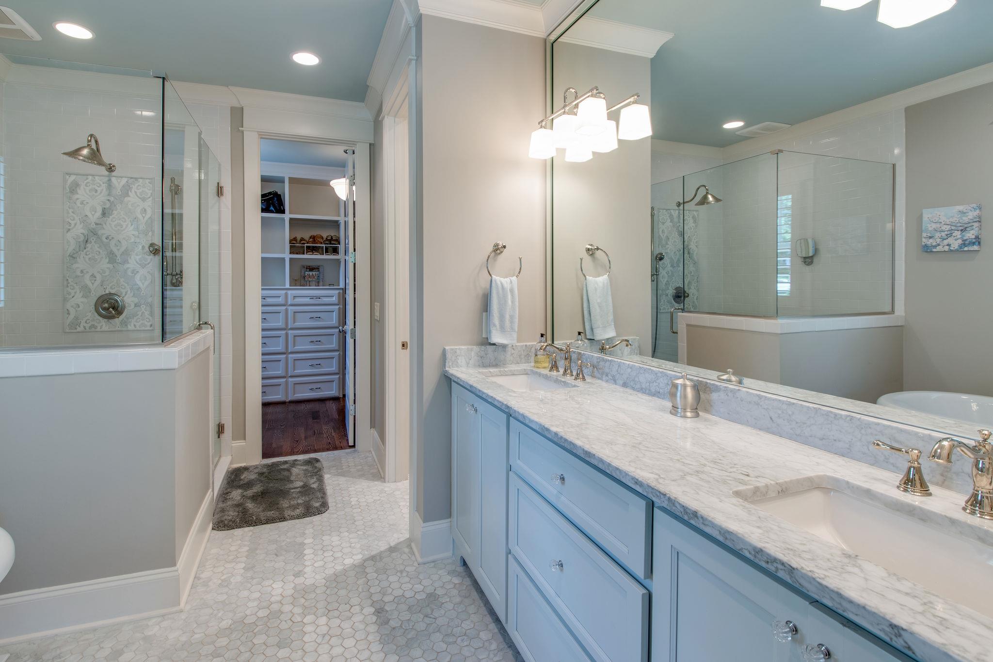 206 Franklin Road Franklin, TN 37064 - Photo 8 of 30 a bathroom with a granite countertop sink a shower and a mirror