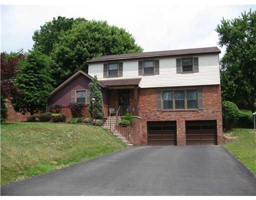 107 North Jamestown Road Coraopolis, PA 15108 - Photo 1 of 18 Exterior Front. Beautiful 4BR/2.5BA home in Wyngate! Long, level driveway will allow for extra parking. The 2 car garage comes w/ garage door openers and extra storage at rear of garage.