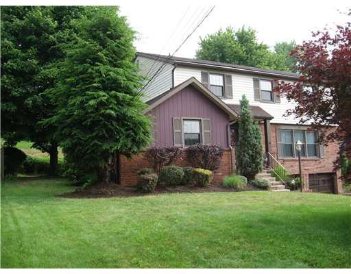 107 North Jamestown Road Coraopolis, PA 15108 - Photo 2 of 18 Exterior Front. Another view of the front shows mature trees and beatiful landscaping!