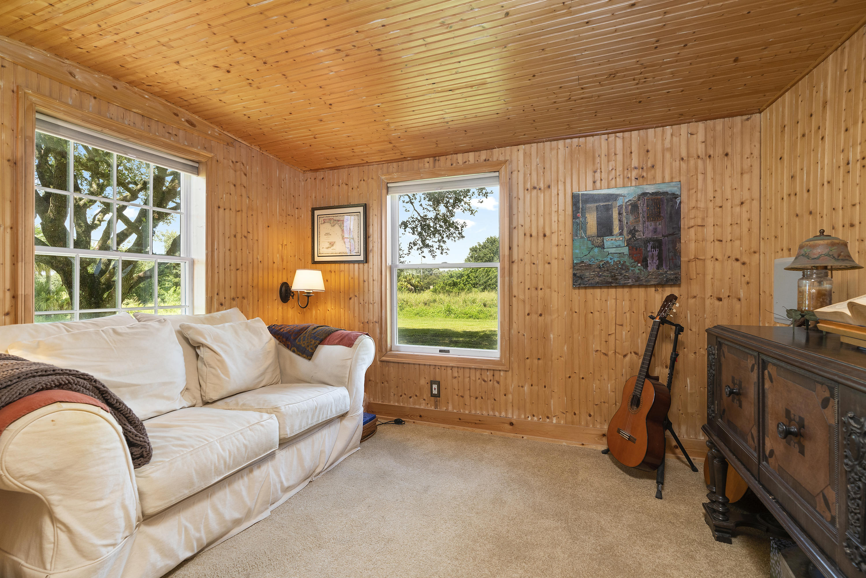 4098 McCarty Road Fort Pierce, FL 34945 - Photo 11 of 38 a living room with furniture and a window