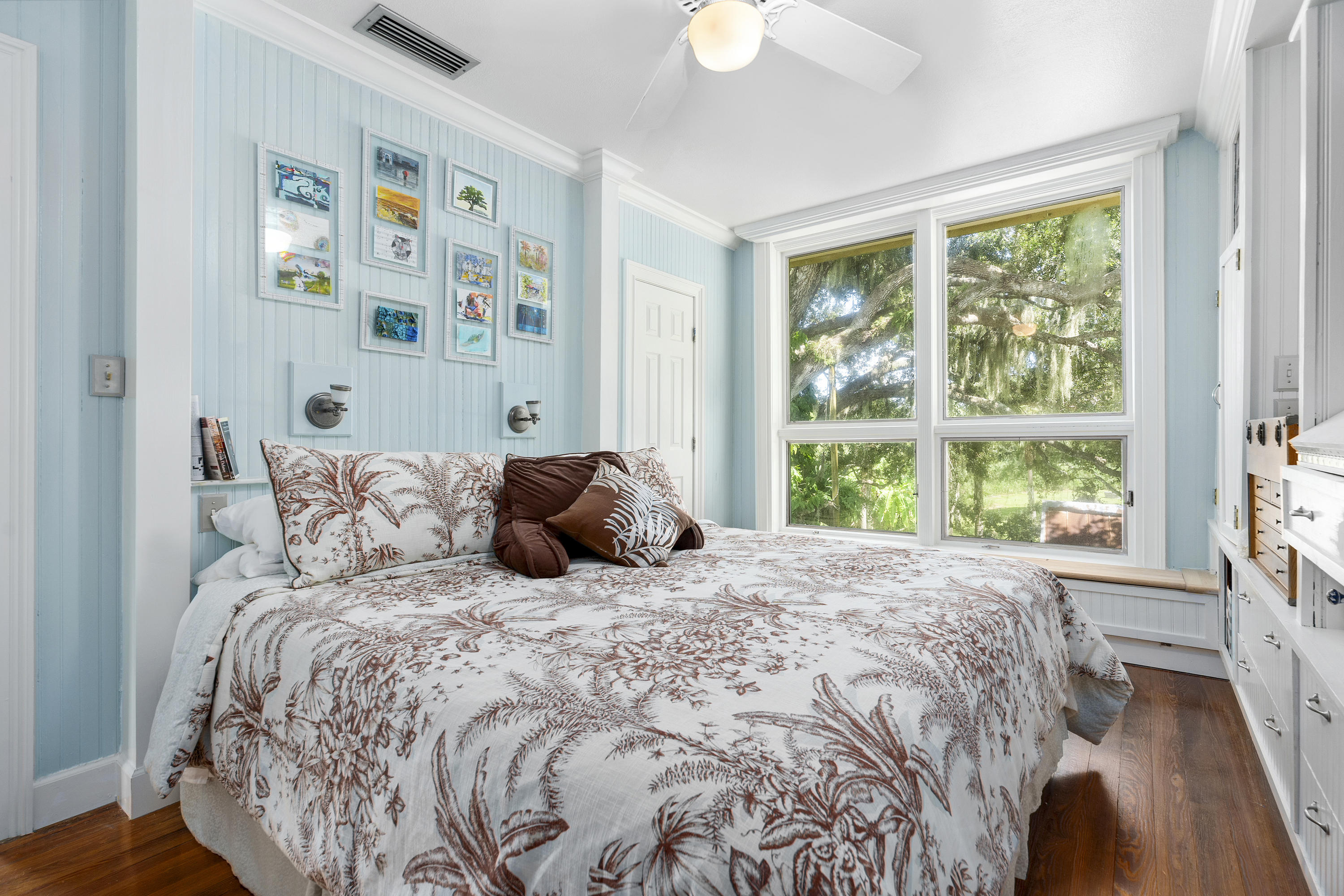 4098 McCarty Road Fort Pierce, FL 34945 - Photo 14 of 38 a large bed sitting in a bedroom next to a window