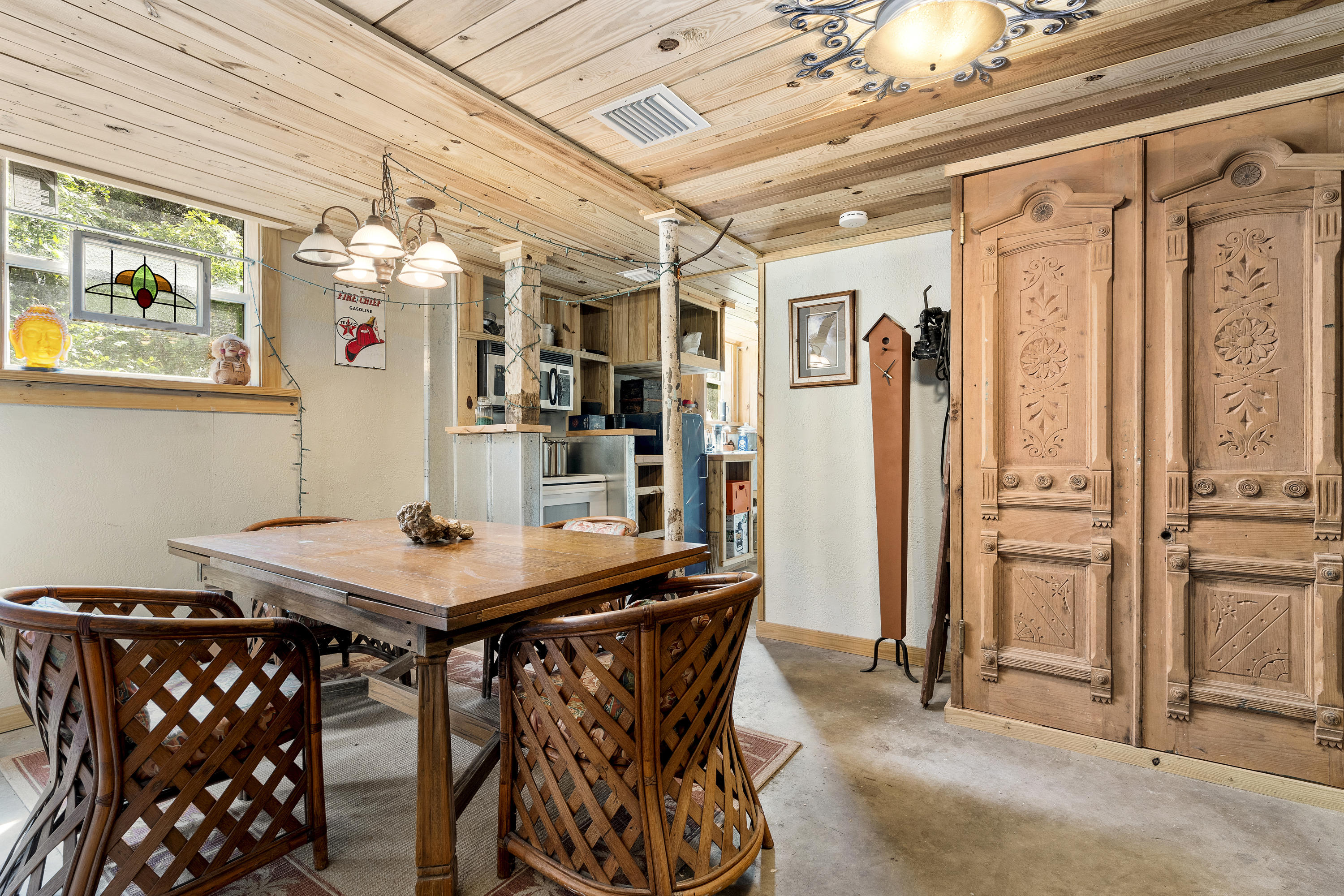 4098 McCarty Road Fort Pierce, FL 34945 - Photo 33 of 38 a view of a dining room with furniture and a chandelier