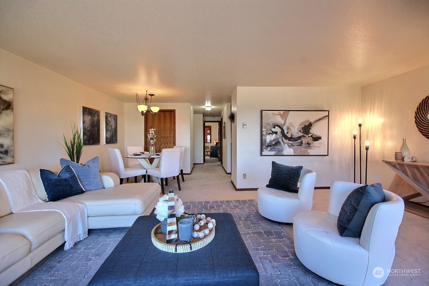 740 North 32nd Street, Unit 1 Renton, WA 98056 - Photo 16 of 32 a living room with furniture kitchen view and a table