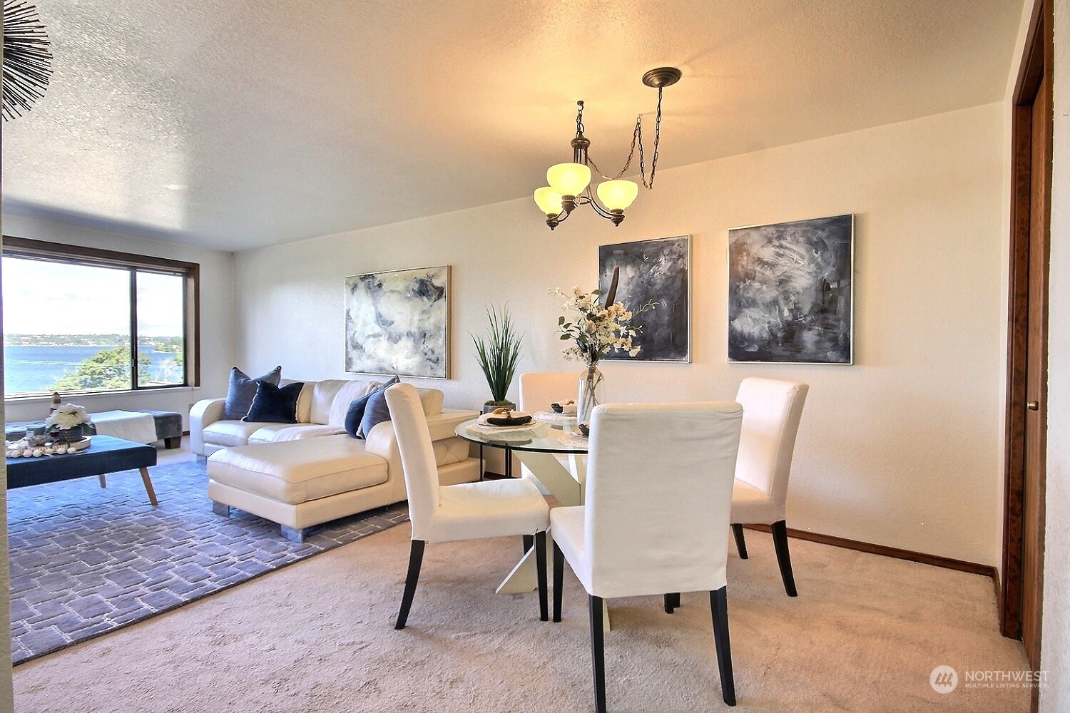 740 North 32nd Street, Unit 1 Renton, WA 98056 - Photo 17 of 32 a living room with furniture chandelier and a table