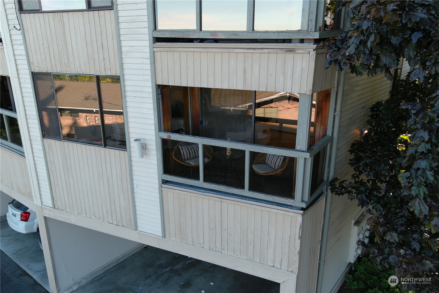 740 North 32nd Street, Unit 1 Renton, WA 98056 - Photo 2 of 32 a view of a balcony with wooden wall and shower