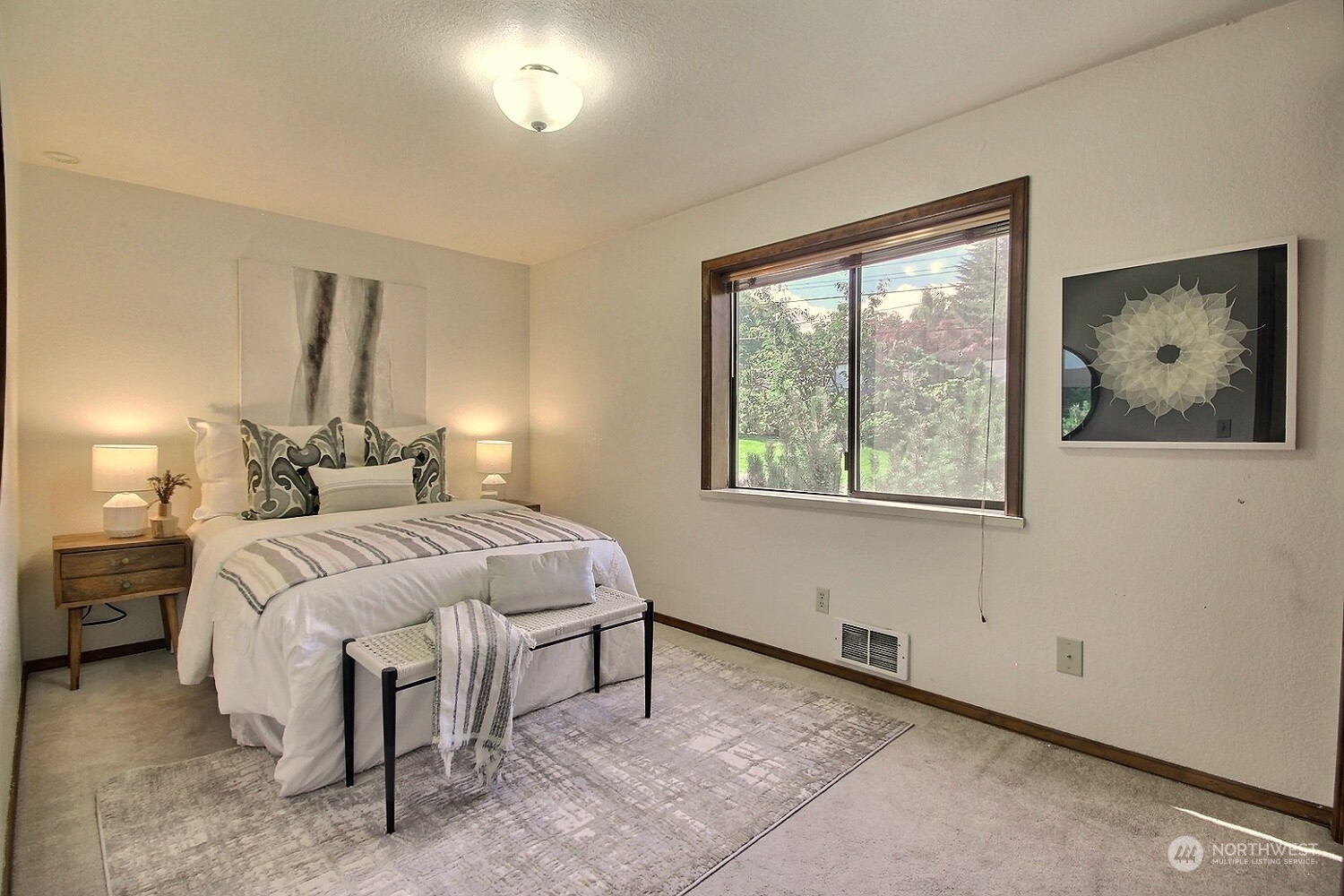740 North 32nd Street, Unit 1 Renton, WA 98056 - Photo 21 of 32 a bedroom with a bed and a window