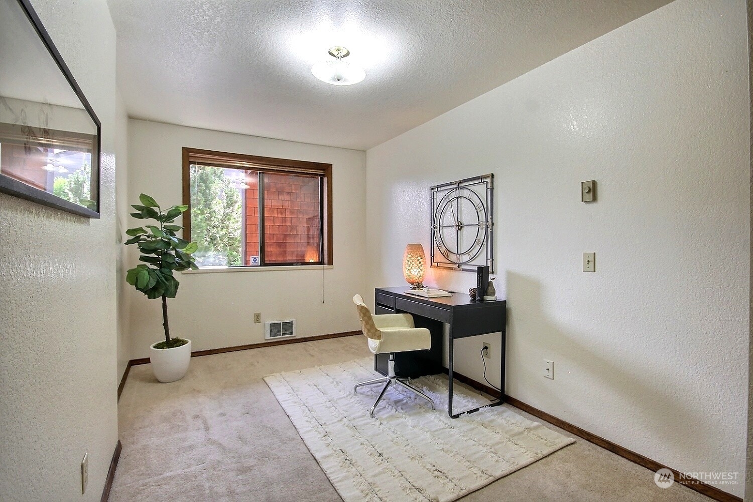 740 North 32nd Street, Unit 1 Renton, WA 98056 - Photo 23 of 32 a view of a workspace with furniture