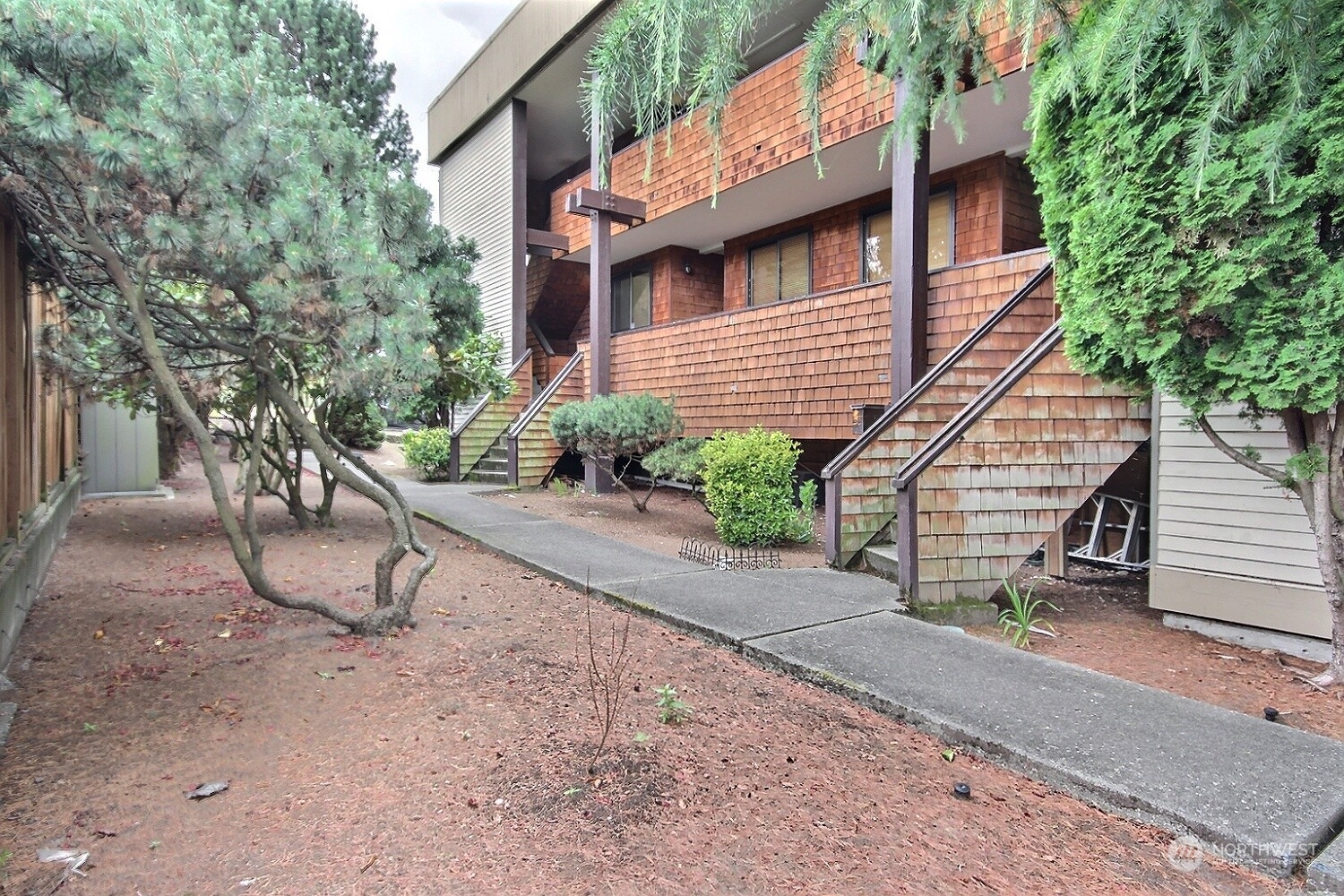 740 North 32nd Street, Unit 1 Renton, WA 98056 - Photo 27 of 32 a view of a house with a yard and tree s
