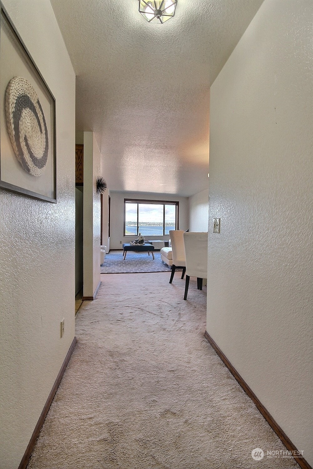 740 North 32nd Street, Unit 1 Renton, WA 98056 - Photo 6 of 32 a view of livingroom with furniture and window