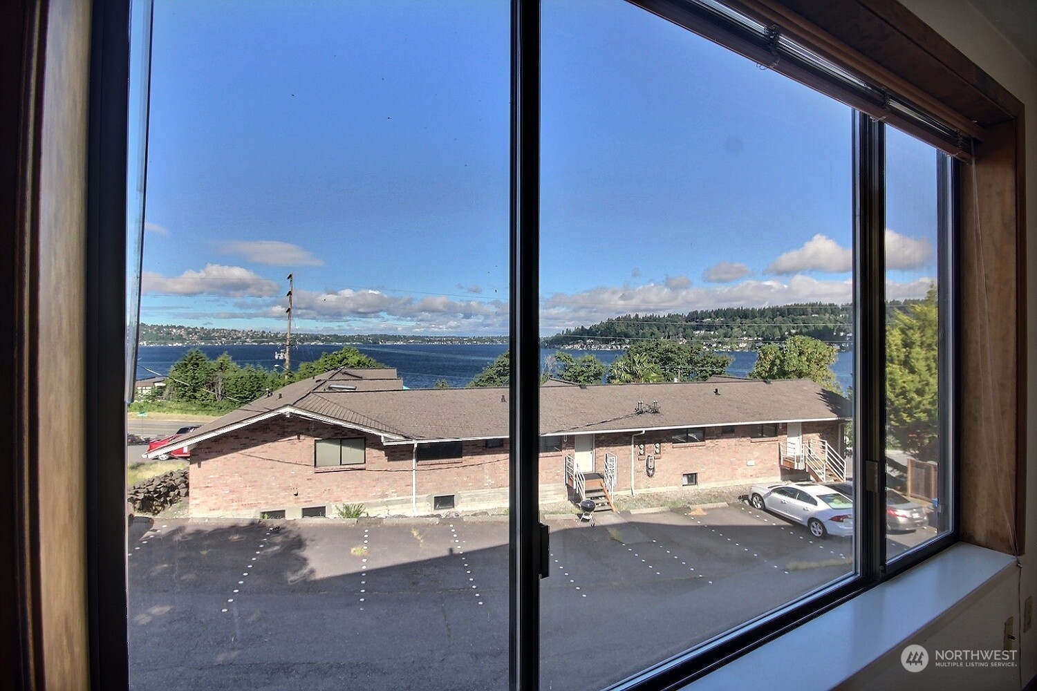 740 North 32nd Street, Unit 1 Renton, WA 98056 - Photo 9 of 32 a view of a glass door from a window