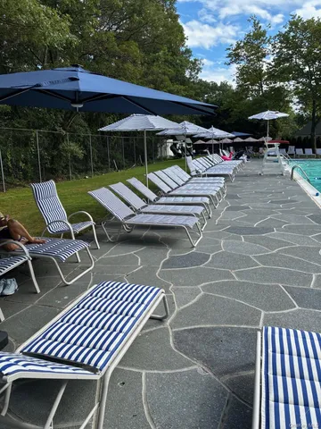 front view of a house with a large window