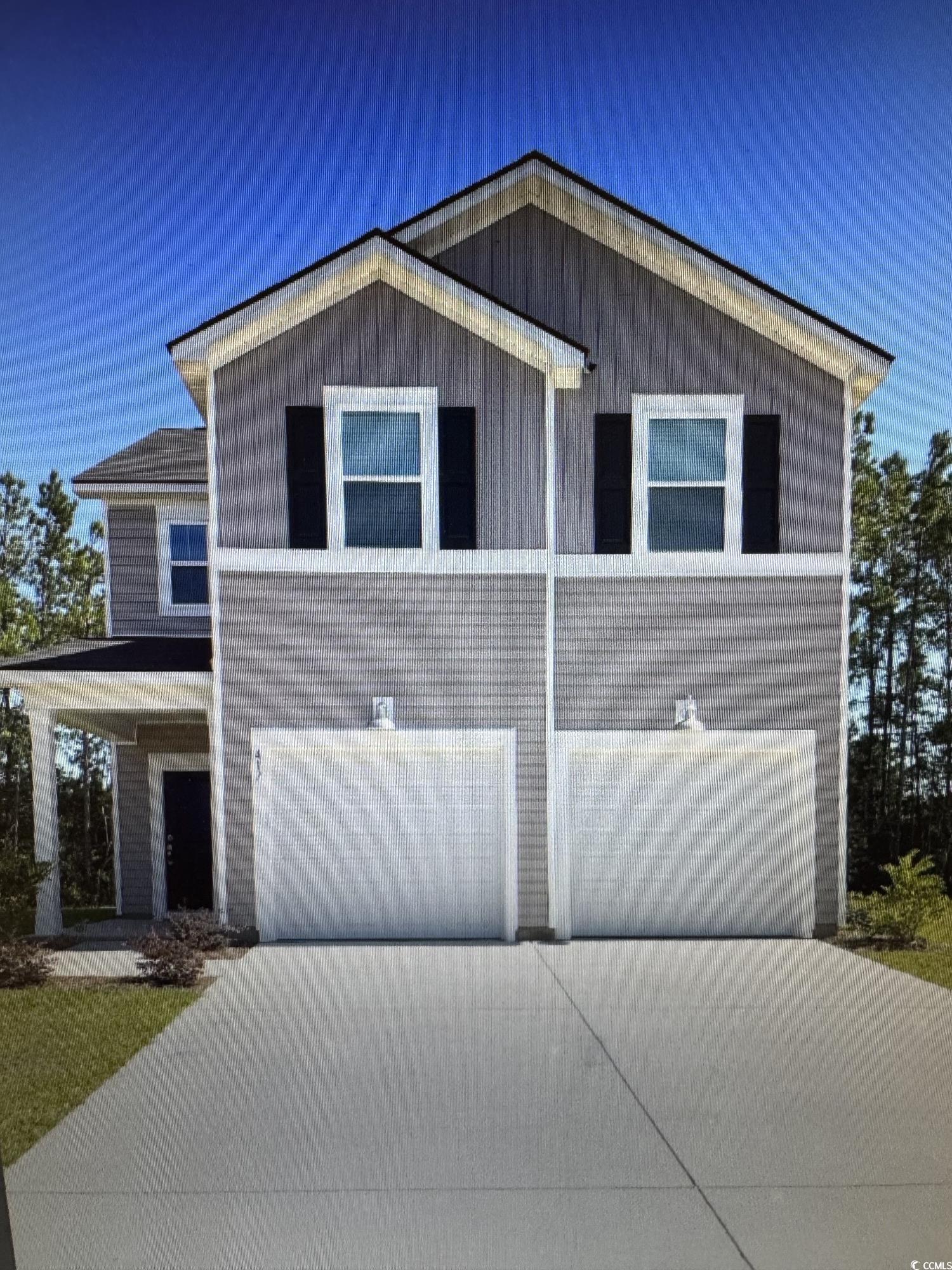417 Falling Leaf Loop Myrtle Beach, SC 29588 - Photo 1 of 17 View of front of property with a garage, driveway,