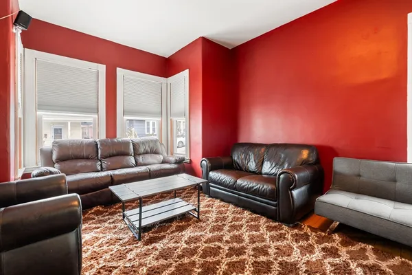 a living room with furniture and a couch