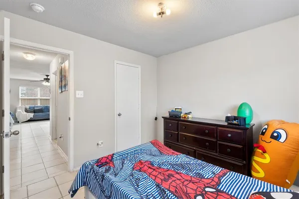 a bathroom with a sink and mirror with toilet