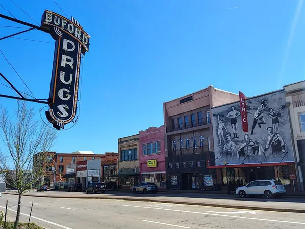 a wooden bench sitting in front of a building