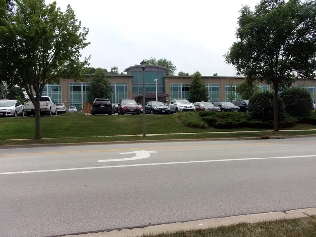 a front view of house with yard and outdoor seating