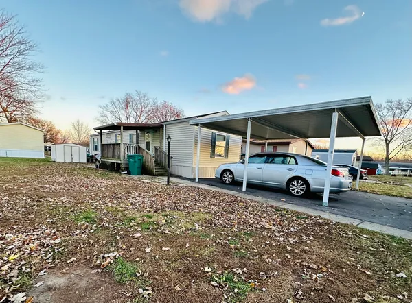 a car parked in front of a house