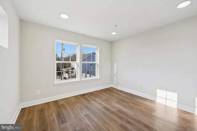 a bathroom with a sink double vanity and a mirror