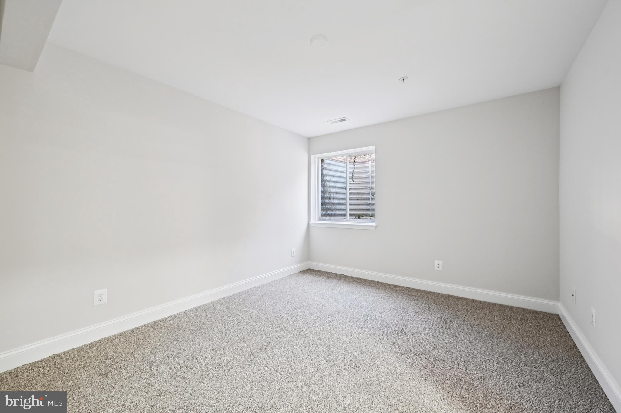 6305 Winters Lane Hanover, MD 21076 - Photo 61 of 83 an empty room with windows