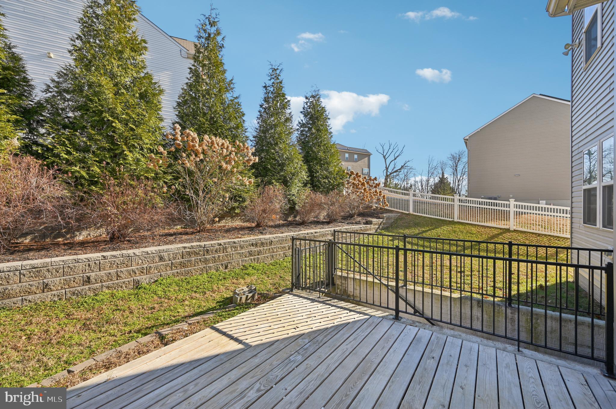 6305 Winters Lane Hanover, MD 21076 - Photo 69 of 83 a view of balcony with wooden floor and fence