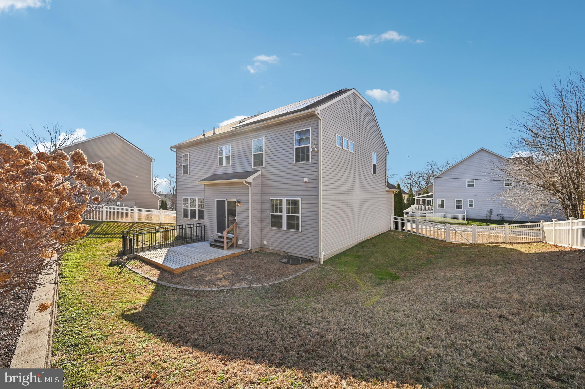 6305 Winters Lane Hanover, MD 21076 - Photo 71 of 83 a view of a house with a yard