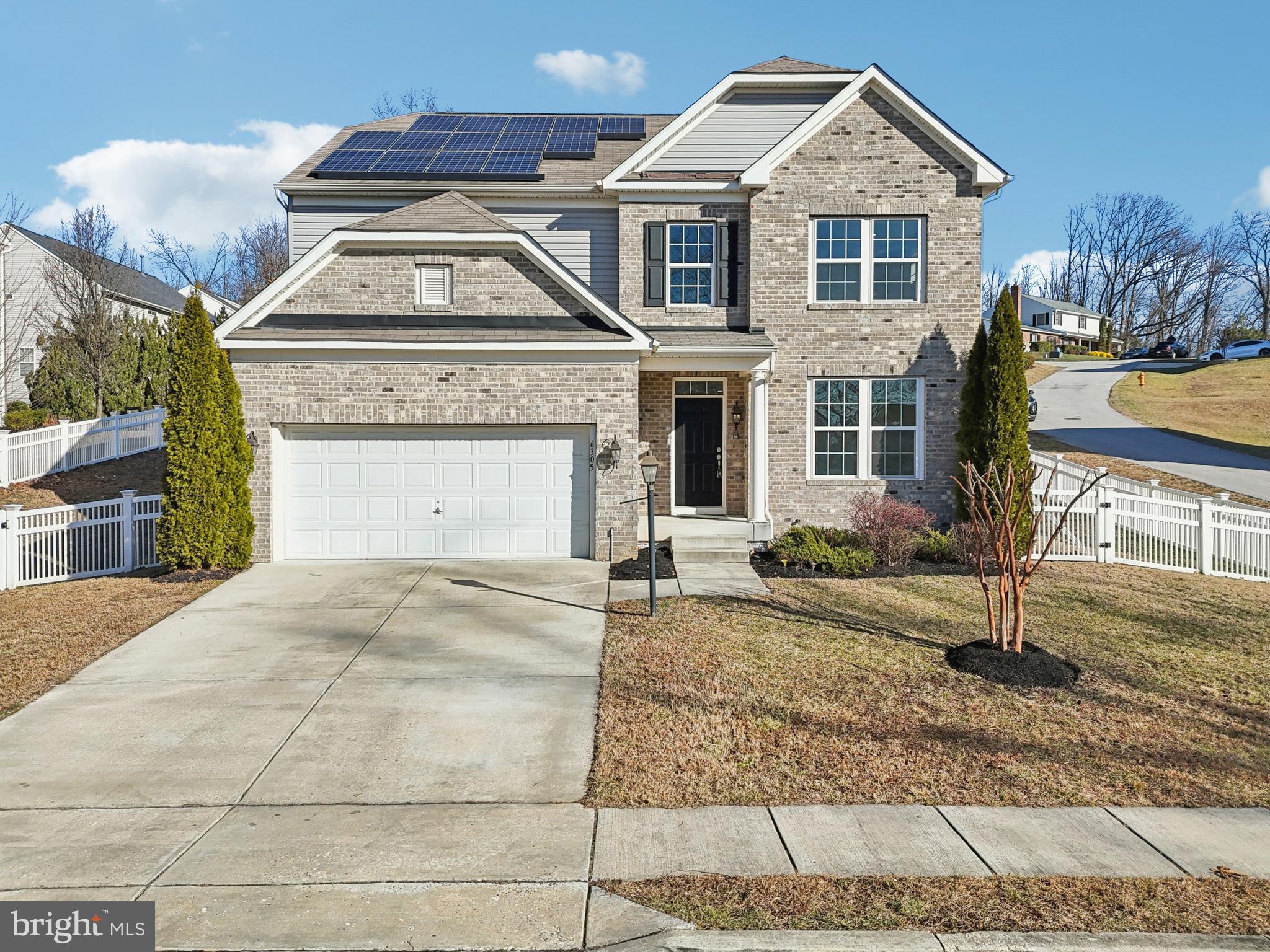 6305 Winters Lane Hanover, MD 21076 - Photo 72 of 83 a front view of a house with a yard