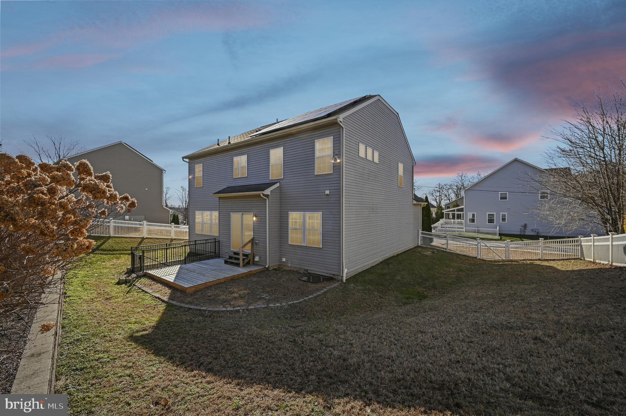 6305 Winters Lane Hanover, MD 21076 - Photo 83 of 83 a front view of a house with garden