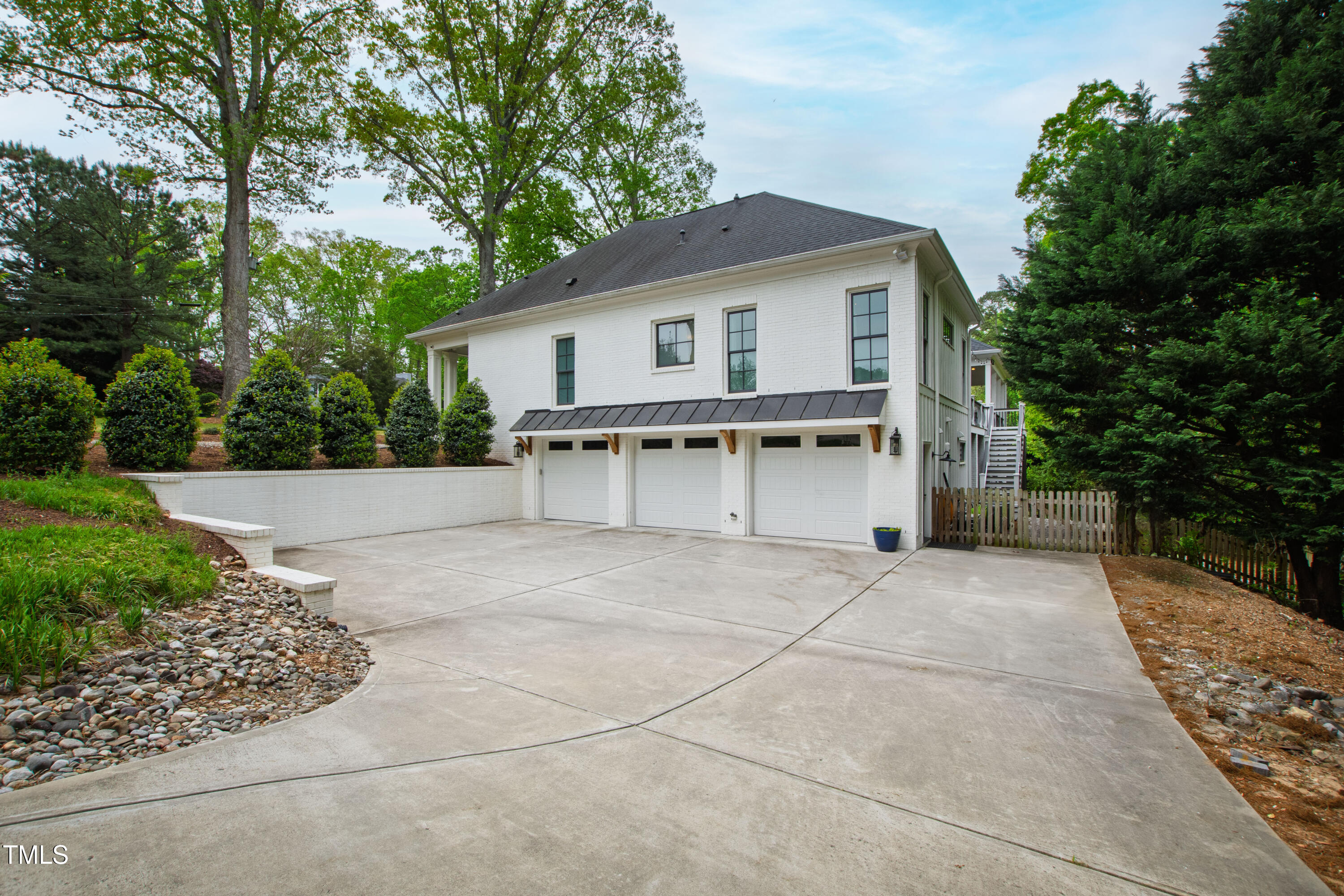 4237 Rowan Street Raleigh, NC 27609 - Photo 33 of 34 a view of a house with backyard and garden