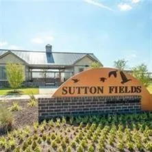 a view of entryway with wooden fence