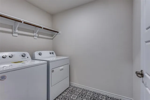 a kitchen with stainless steel appliances granite countertop a sink a stove and a wooden floors