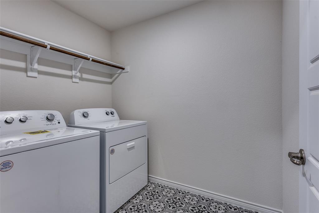 6213 Abby Drive Aubrey, TX 76227 - Photo 13 of 32 a utility room with dryer and washer