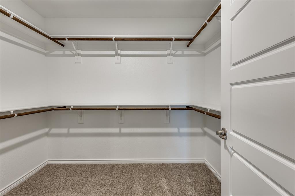 6213 Abby Drive Aubrey, TX 76227 - Photo 18 of 32 a view of walk in closet