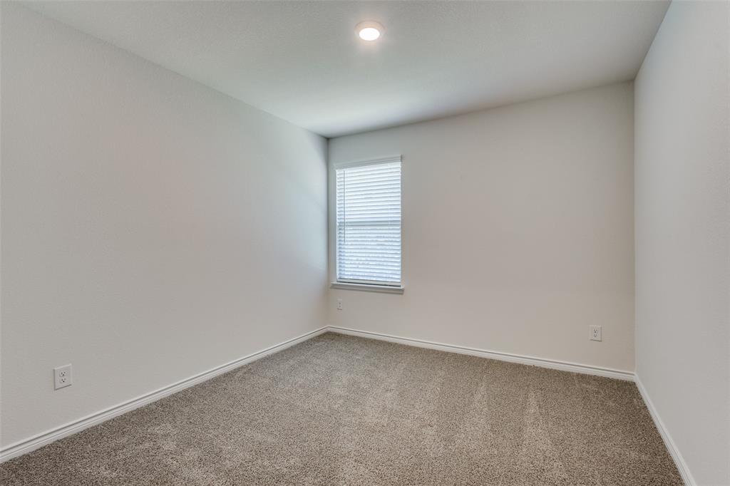 6213 Abby Drive Aubrey, TX 76227 - Photo 19 of 32 an empty room with a window